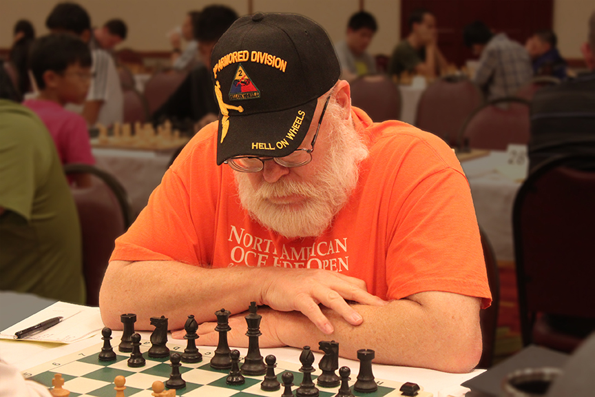 SERIOUS CHESS PLAYERS FOUNDER JIM HOLLINGSWORTH - PLAYING IN THE 2016 TEXAS STATE CHAMPIONSHIP - PHOTO BY CHENG ZHONG