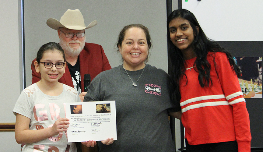 From left to right: Deputy Master of Ceremonies Anneliese Garcia; Chief Organizer and Fundraiser Jim Hollingsworth; Margaret Bailon-Labednick; and Games Judge Sharon Basepogu. Photo by Sheryl Mc Broom at North Richland Hills Library.