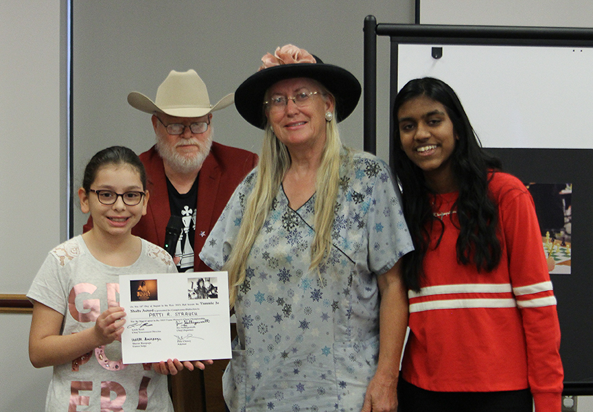 From left to right: Deputy Master of Ceremonies Anneliese Garcia; Chief Organizer and Fundraiser Jim Hollingsworth; Doctor Patti Strauch; and Games Judge Sharon Basepogu. Photo by Sheryl Mc Broom at North Richland Hills Library.